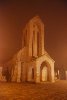Hình ảnh Nhà thờ đá tại thị trấn chìm trong sương khói. - Sapa